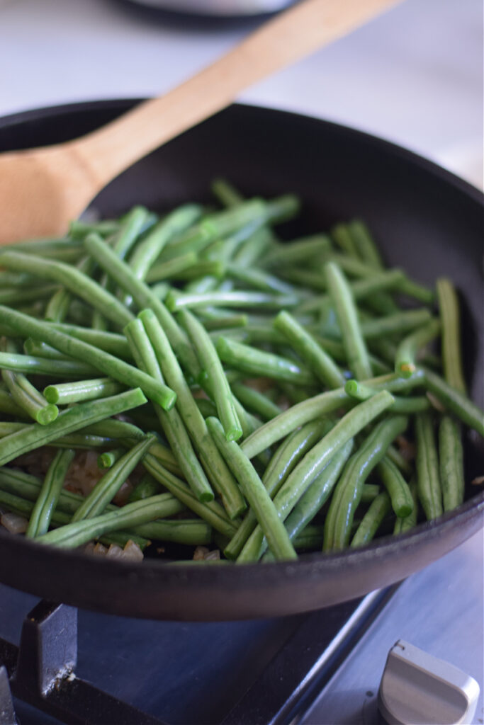 Green beans in a skillet.