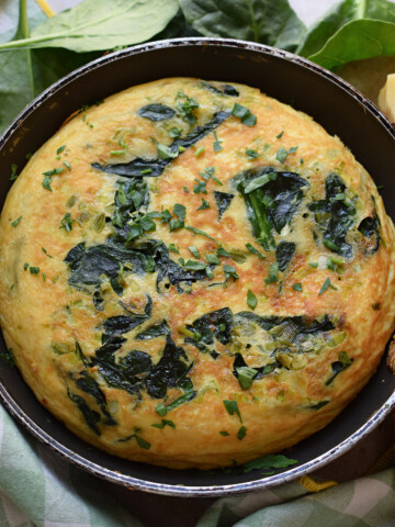 A skillet frittata in a skillet.