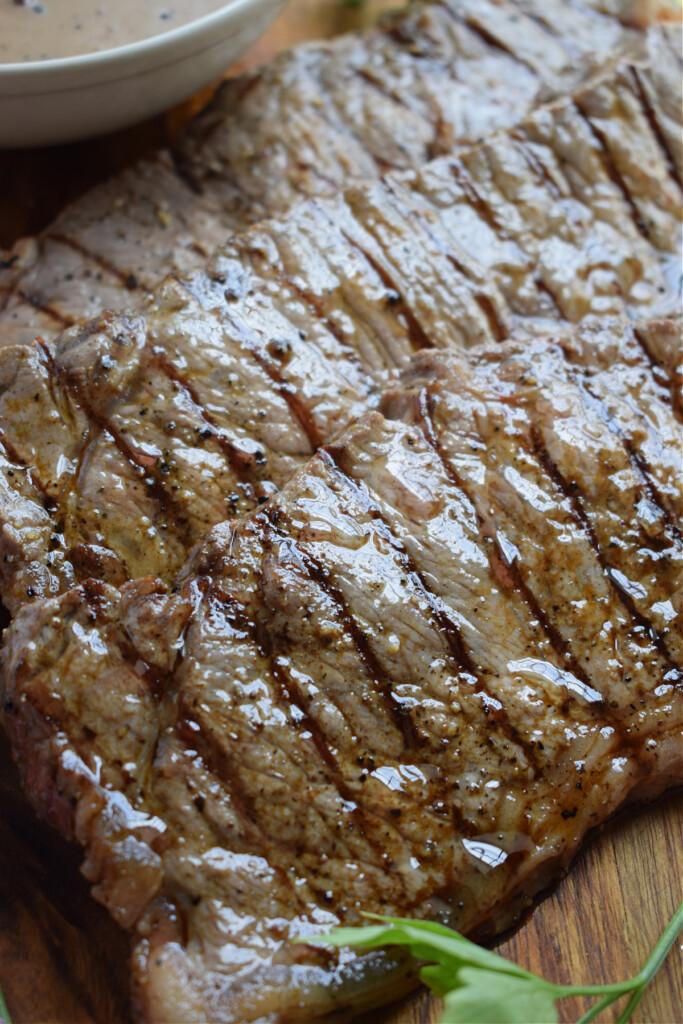 Close up of grilled steaks.