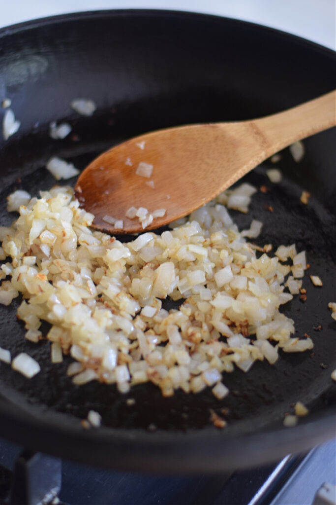 Cooked onions in a skillet.
