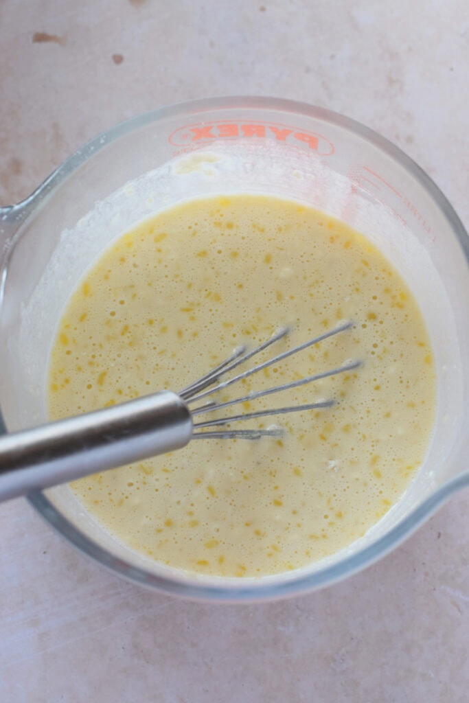 Waffle batter in a glass dish.