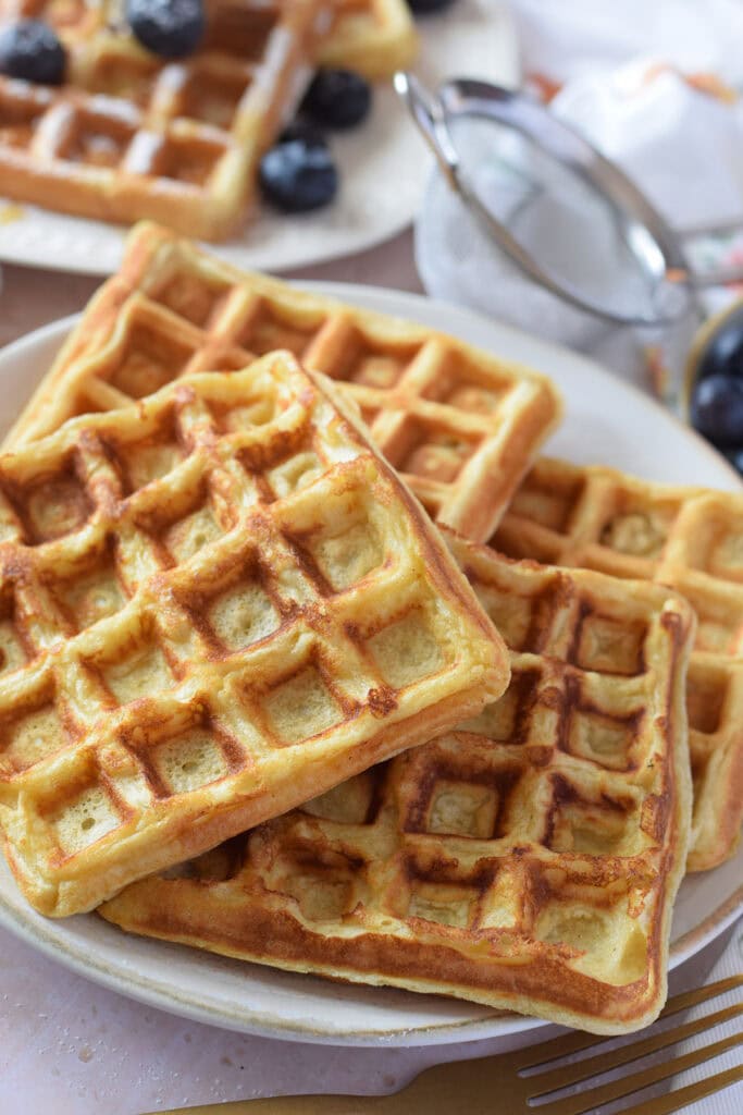 Buttermilk waffles on a plate.