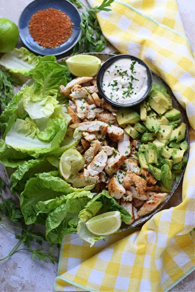 Chicken and avocado salad cups on a platter.