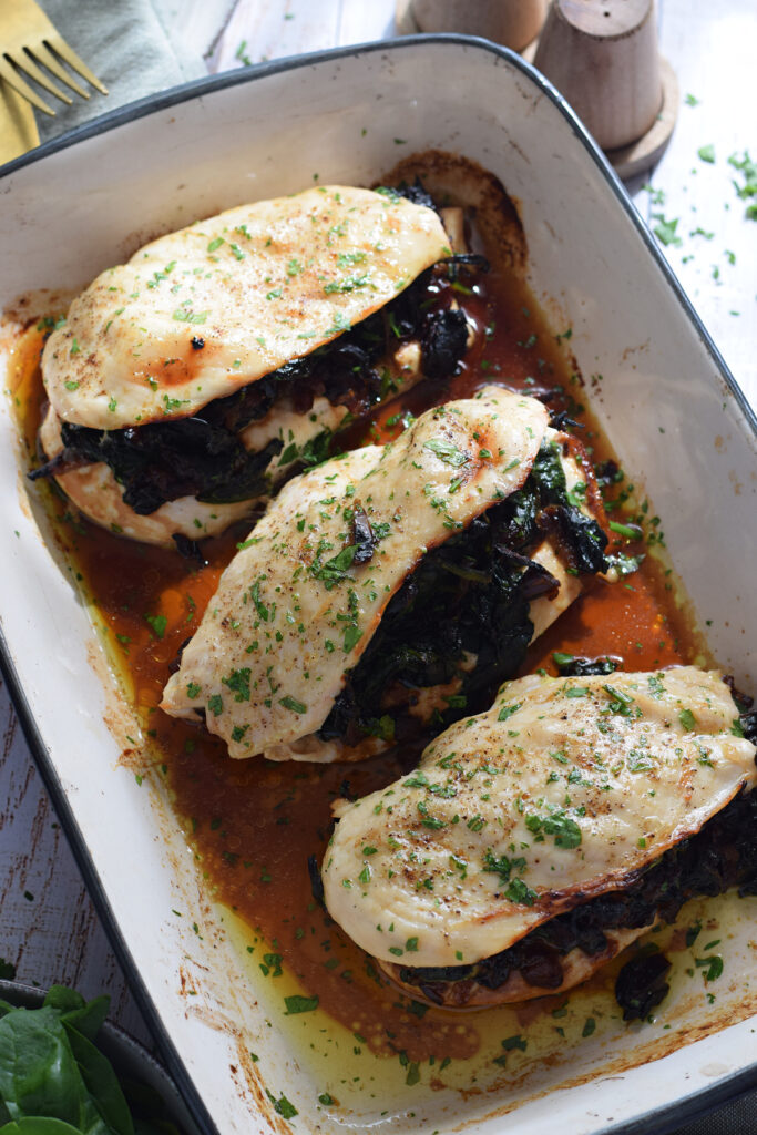 Chicken breast in a casserole dish.
