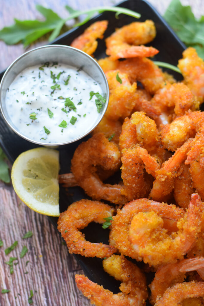 Close up of shrimp with a dip.