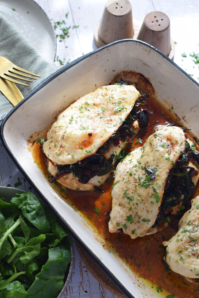 Chicken breast in a serving dish.