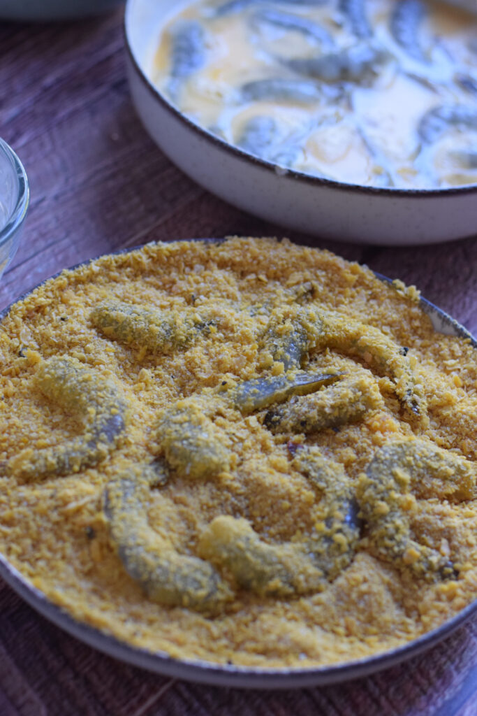 Shrimp coated in bread crumbs.