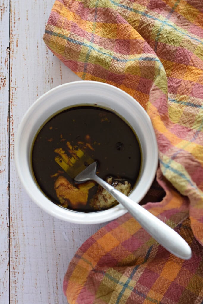 Balsamic vinaigrette in a white bowl.