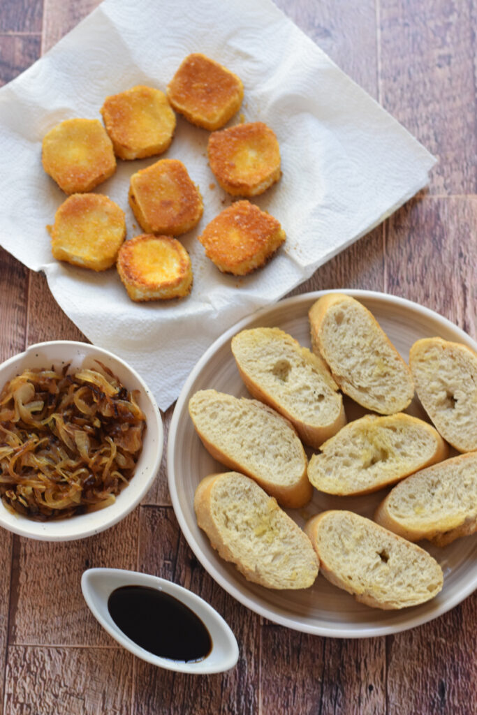 Making caramelized onion bruschetta.