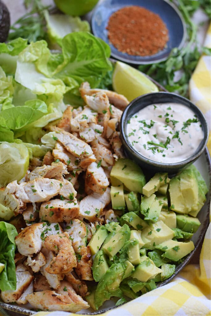 Close up of chicken and avocado lettuce wraps.