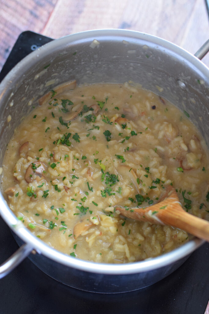 Making risotto in a saucepan.