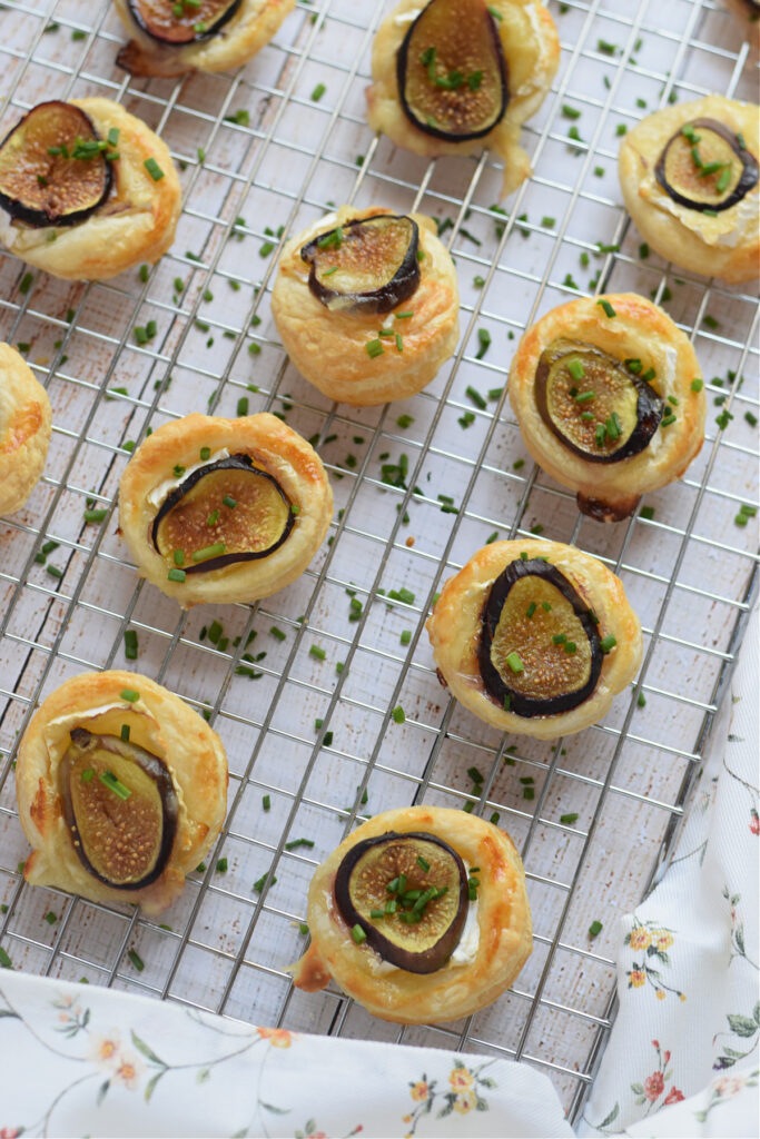 Pastry appetizers on a cooling rack.