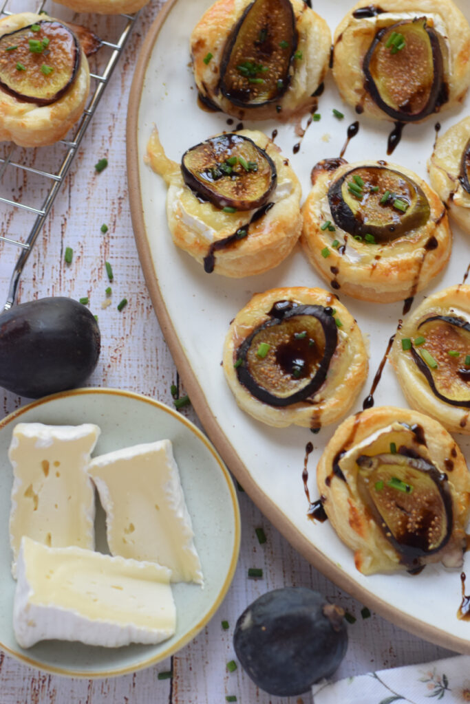 Close up of fig appetizers on a plate.