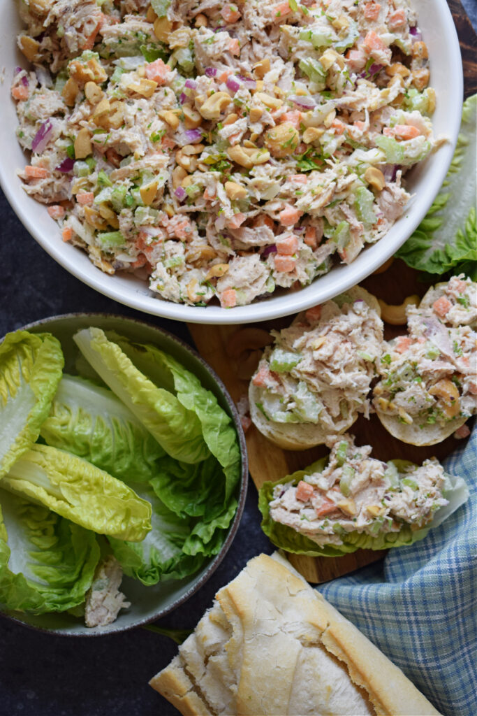 Chicken salad with lettuce and bread.