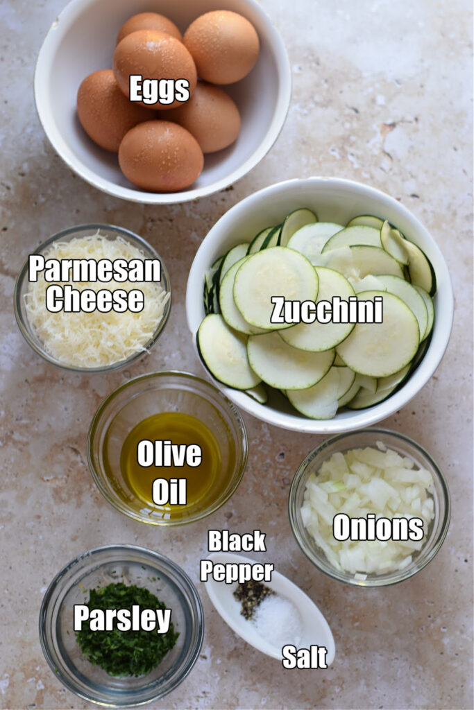 Ingredients to make zucchini and parmesan frittata.