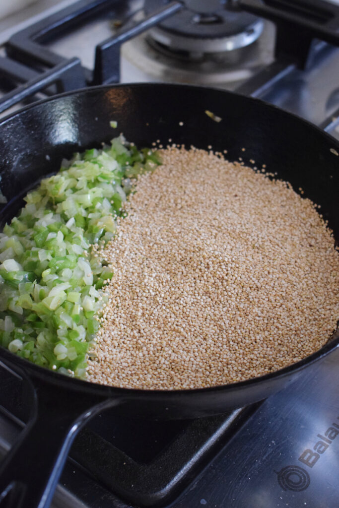 Cooking quinoa in a skillet.