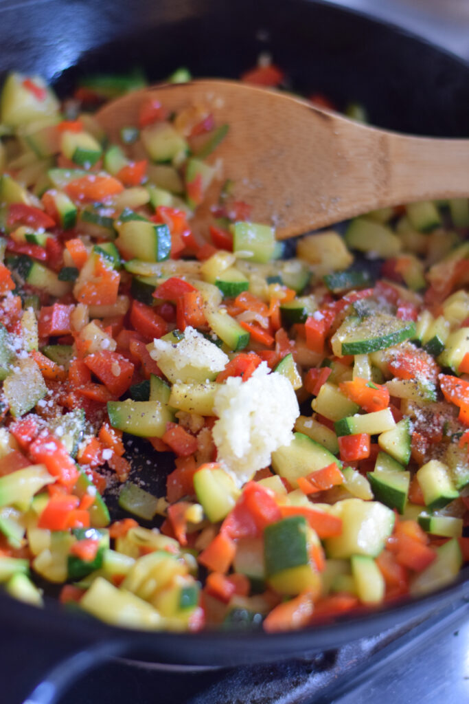 Add seasonings to vegetables.