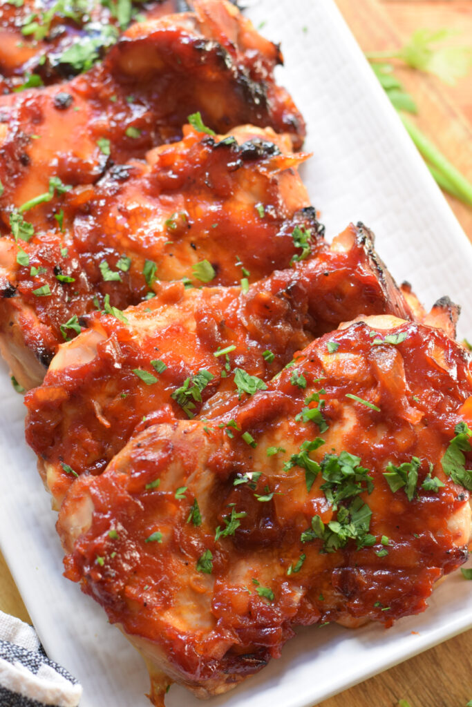 Close up of oven barbecue chicken thighs.