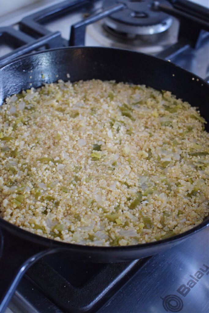 Cooked quinoa in a skillet.