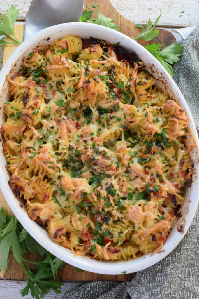 Pasta bake in a white casserole dish.