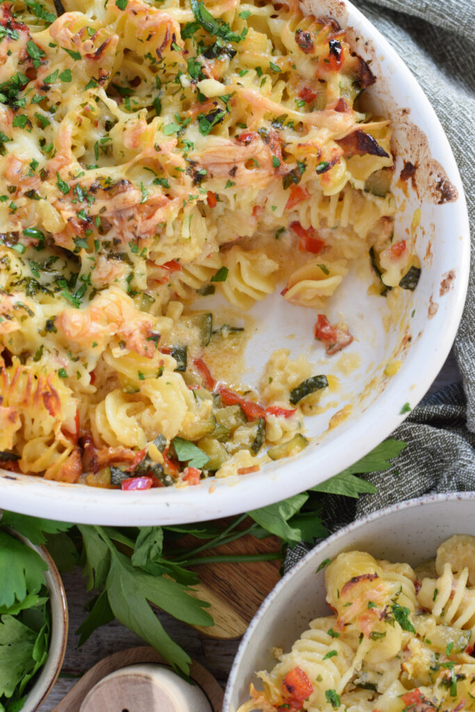 Pasta bake in a white casserole dish.