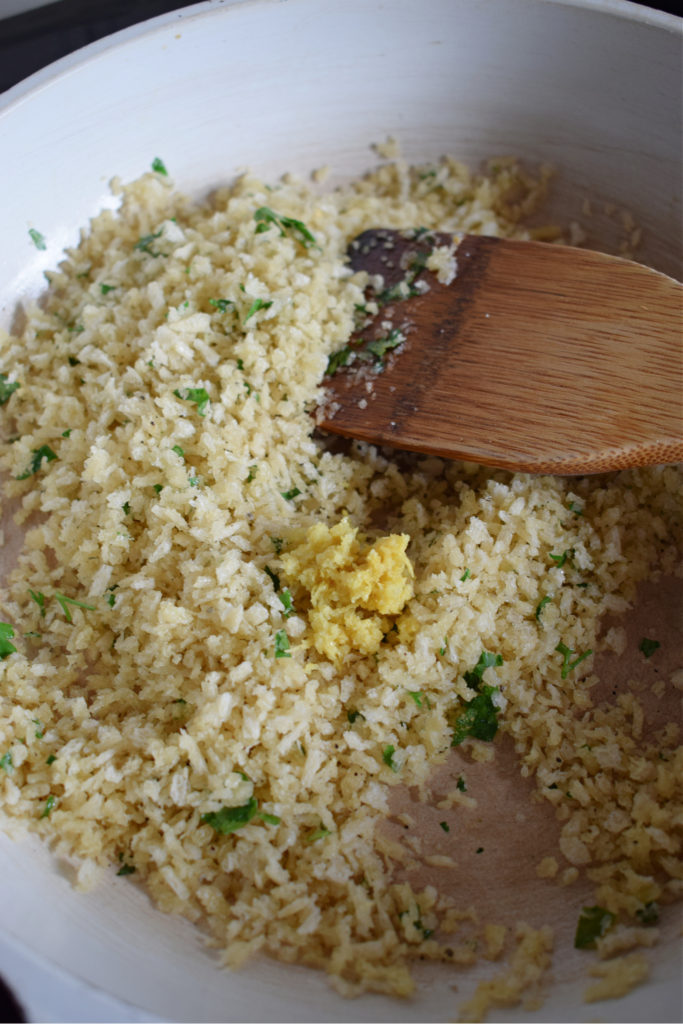 frying bread crumbs in herbs and butter