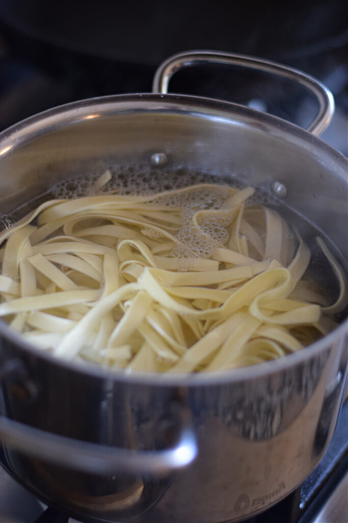 Cooking pasta in a pot.
