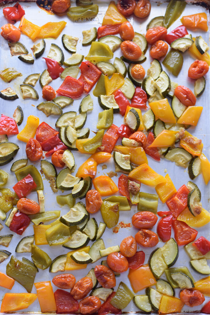 Roasted vegetables on a tray.