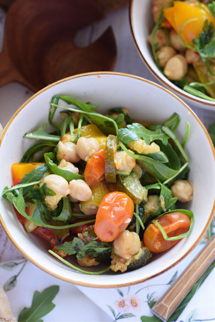 Mediterranean salad in a white bowl.