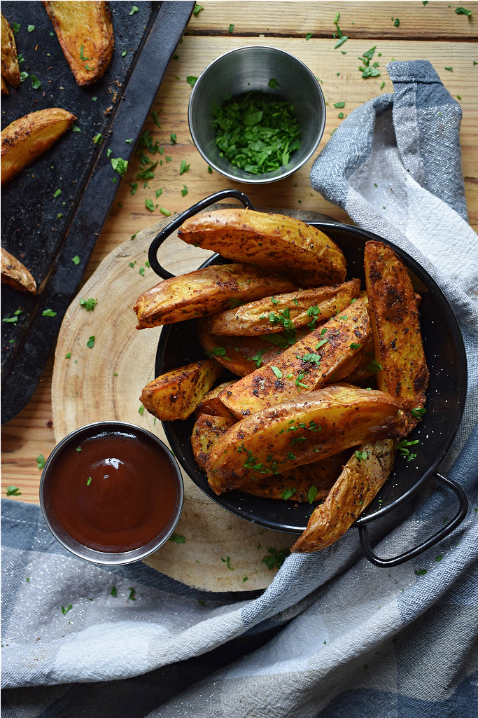 over head table view of spiced potato wedges