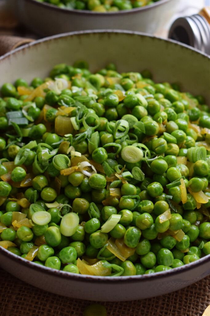 Close up of curried spiced peas.