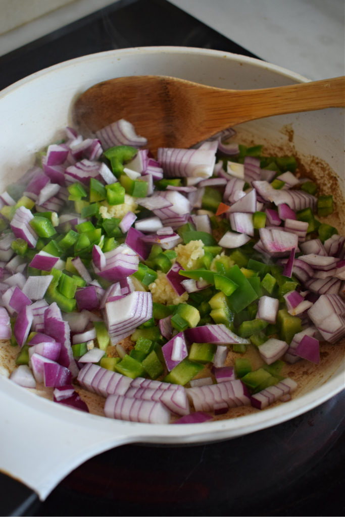 vegetables in a pan to make mexican rice