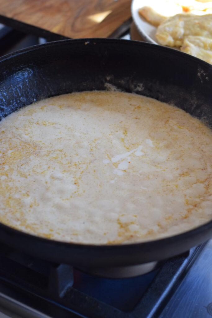 Making lemon cream sauce.