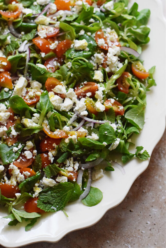 Close up of tomato feta salad.