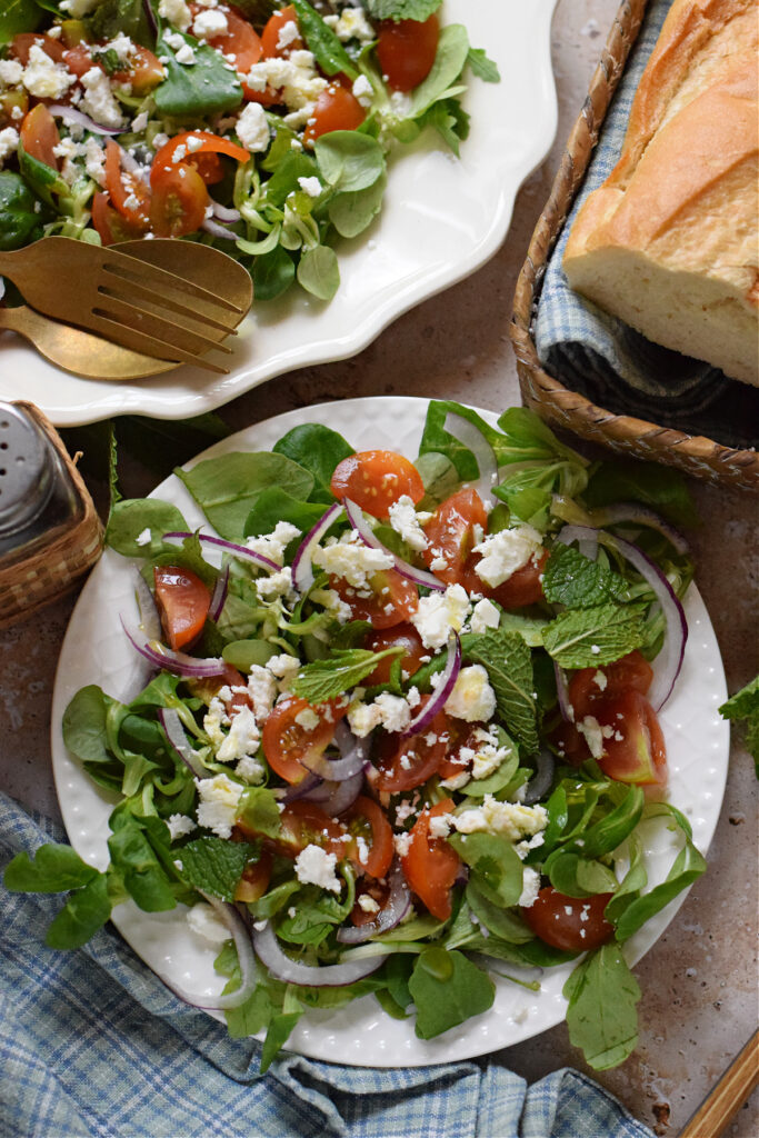 Fresh salad on a serving plate.