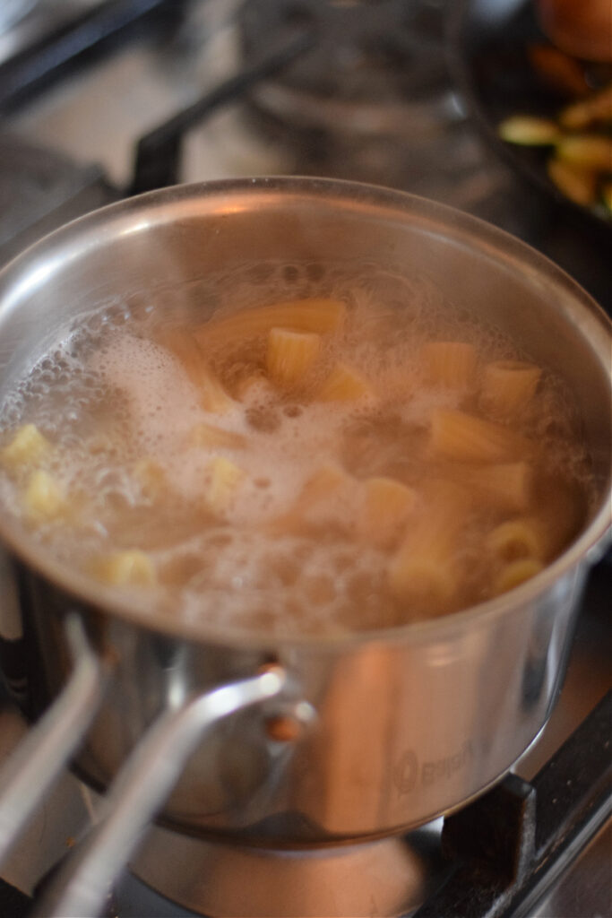 Cooking pasta in a saucepan.