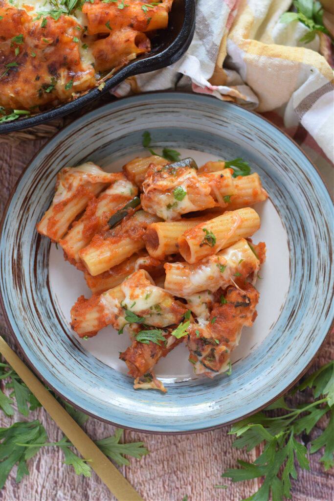 Baked zucchini pasta on a plate.