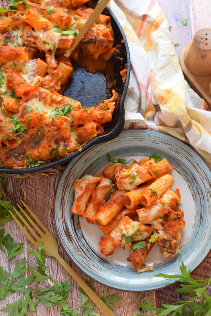 Baked zucchini pasta on a serving plate.