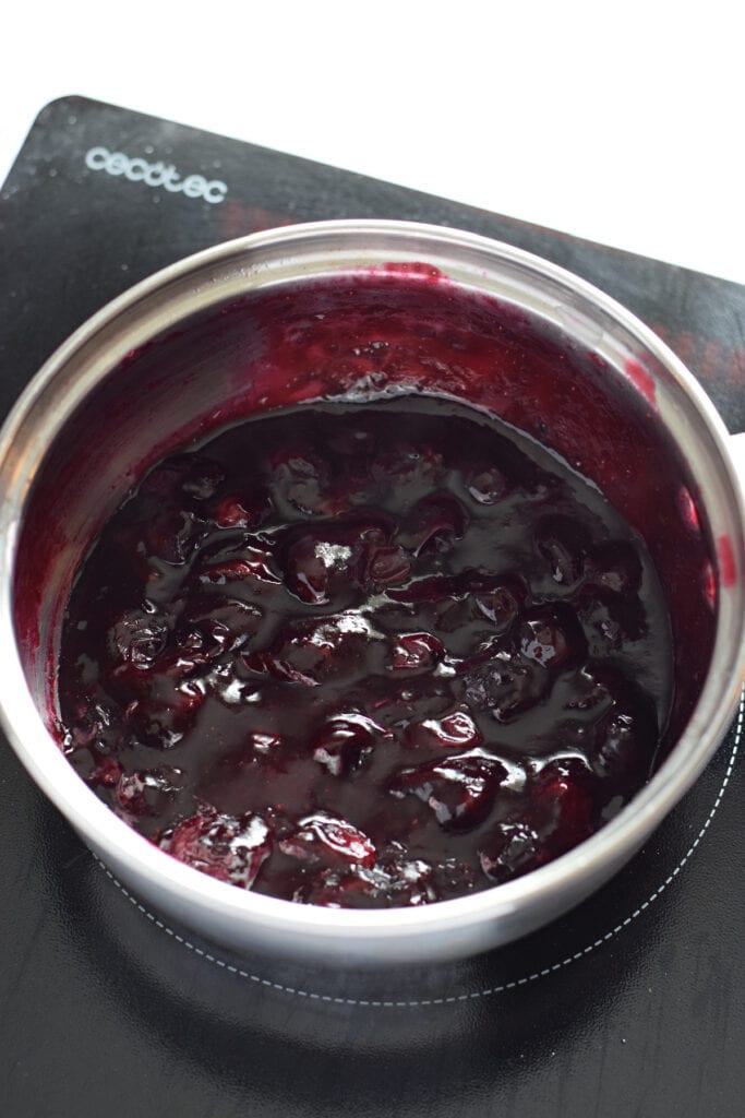 Blueberry sauce in a saucepan.