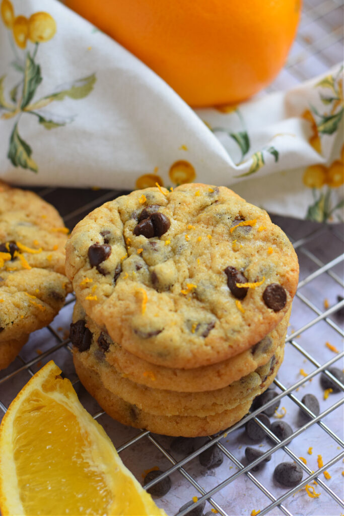 A stack of orange chocolate chip cookies.