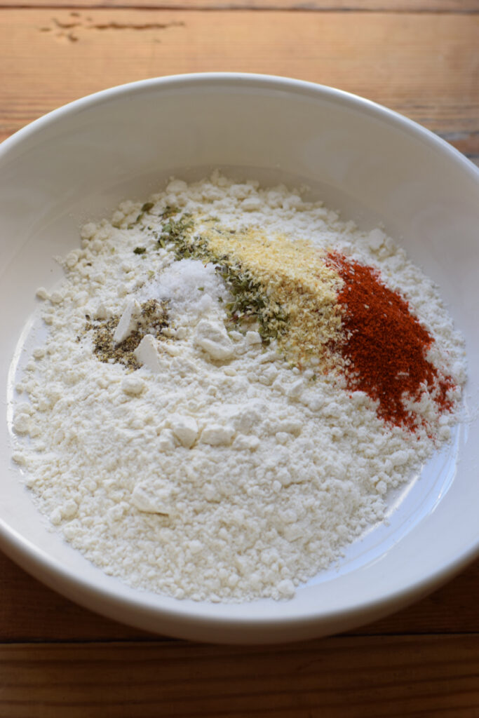 Dry ingredients in a bowl to make onion ring batter.