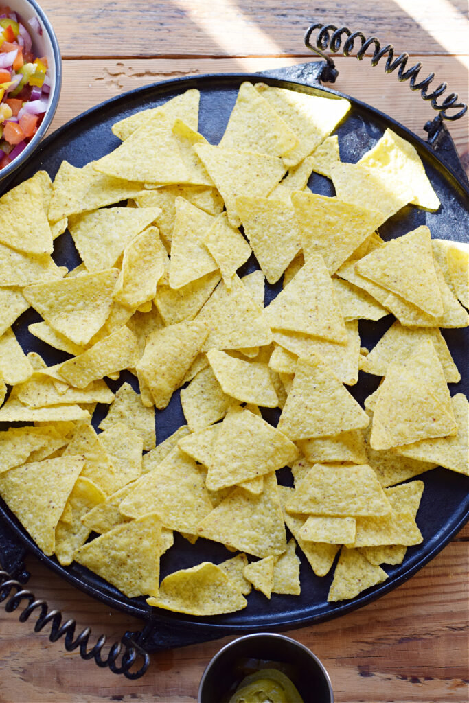 Nachos on a large platter.