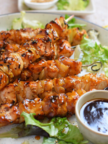 Close up of grilled teriyaki chicken skewers.