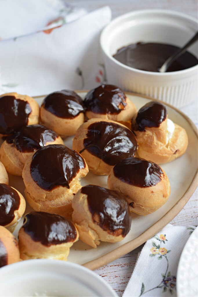 Close up of profiteroles on a tray.