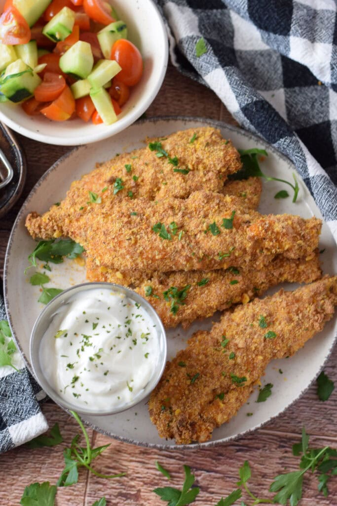 Cajun chicken tenders on a plate.