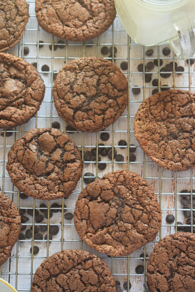 Double chocolate cookies on a cooling rack.