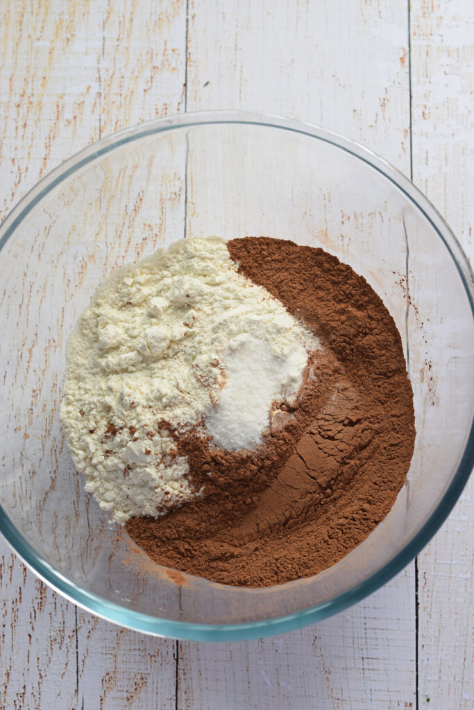 Dry ingredients in a bowl to make chocolate cookies.