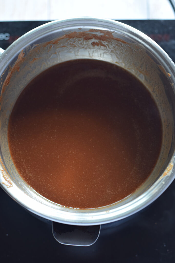 Melted chocolate in a saucepan.