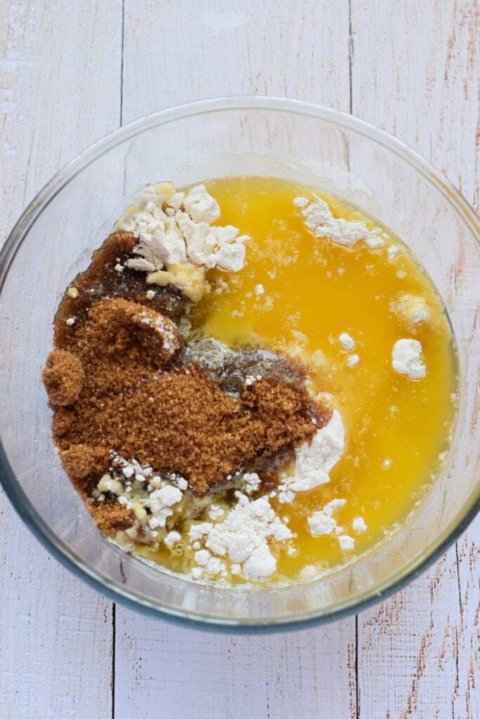 Ingredients in a glass bowl to make a cookie base.