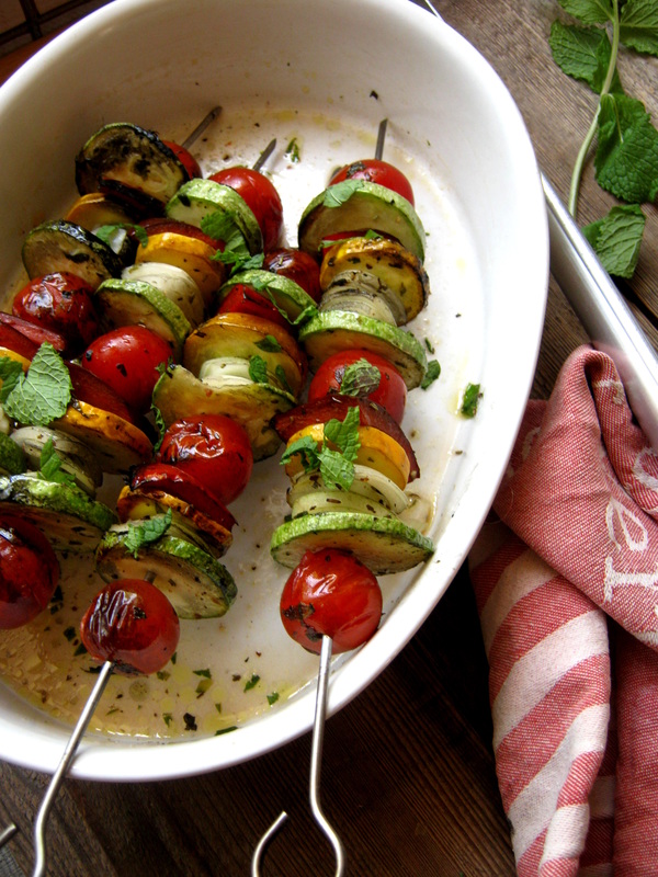 Barbecue Vegetable Kebabs in a Mint & Lemon Marinade in a white serving dish